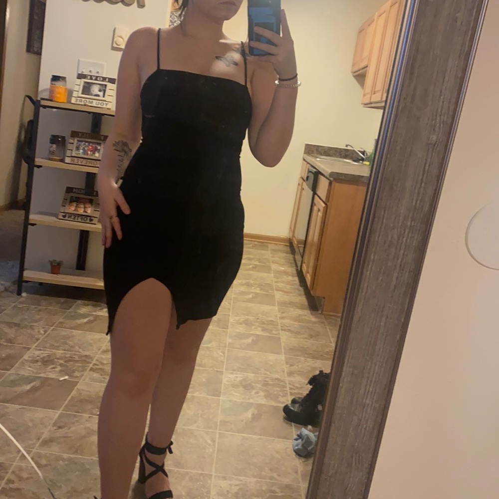 Black mini dress with slit
